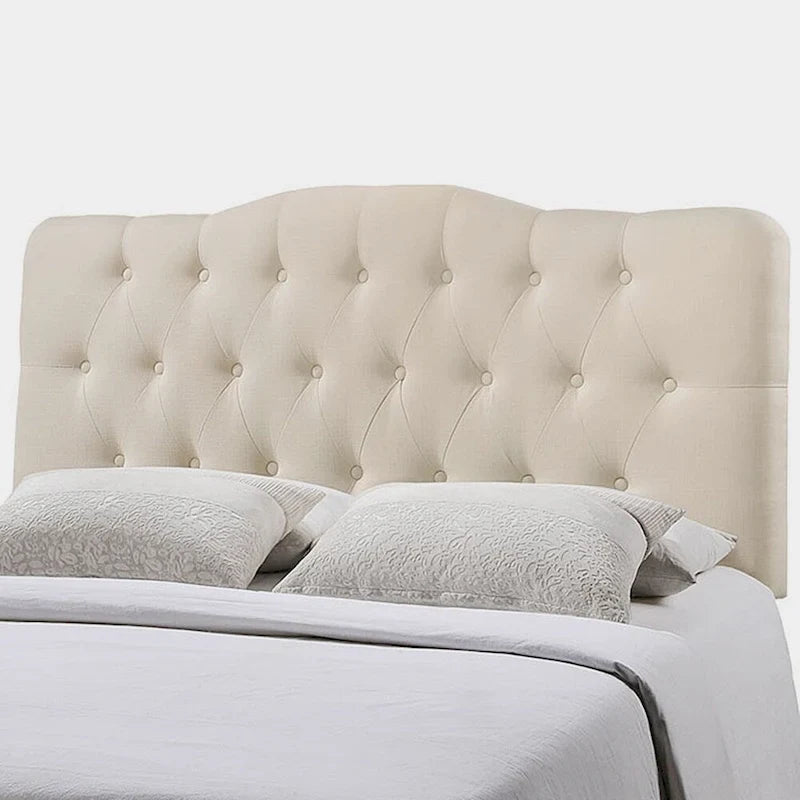 Tête de lit capitonnée en tissu pour grand lit (King)